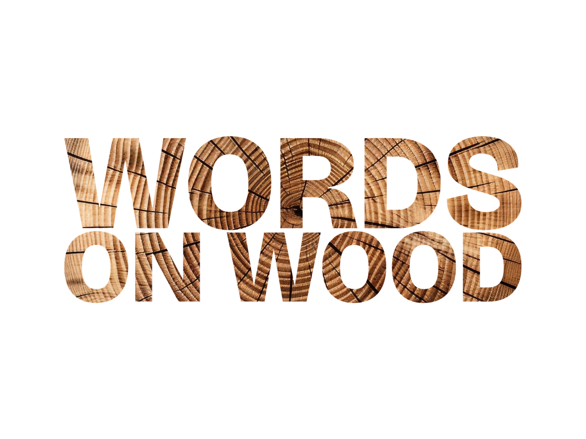 Words On Wood logo, designed with wood-grain texture and crafted lettering.